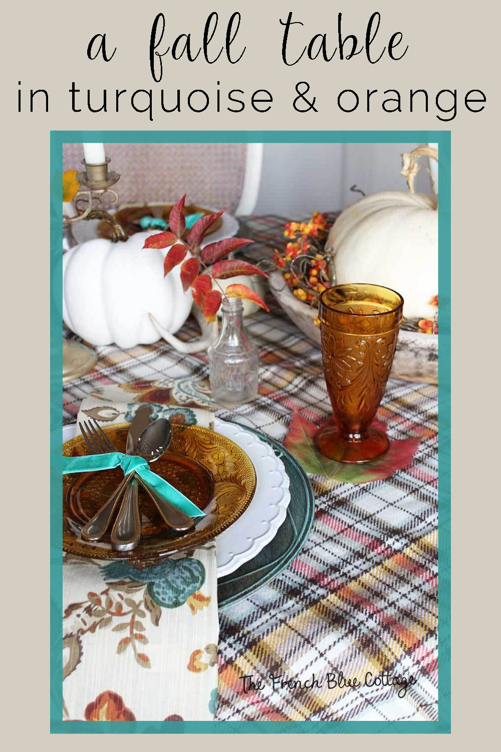 fall table with a plaid scarf as the tablecloth and velvet ribbon on the silverware