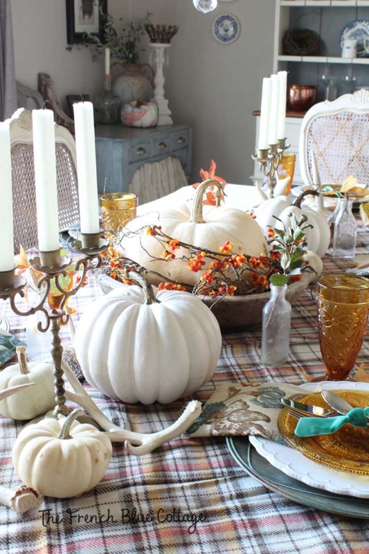 Lovely fall tablescape with gold candelabra.