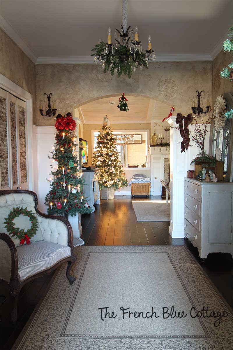 French country entryway dressed for Christmas.