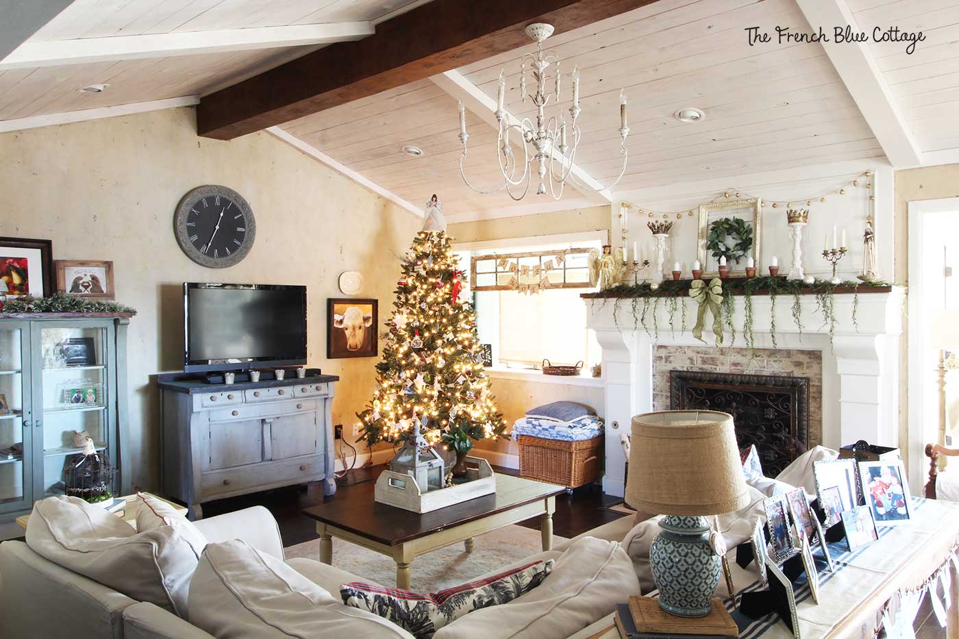 A French country living room decorated for Christmas.