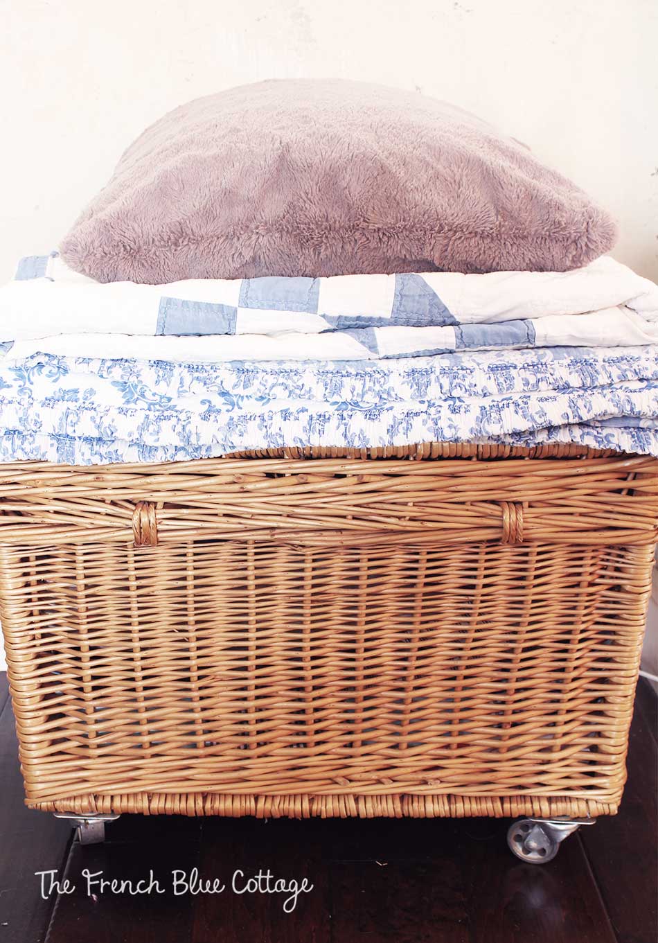 Cozy stack of blankets and quilts.