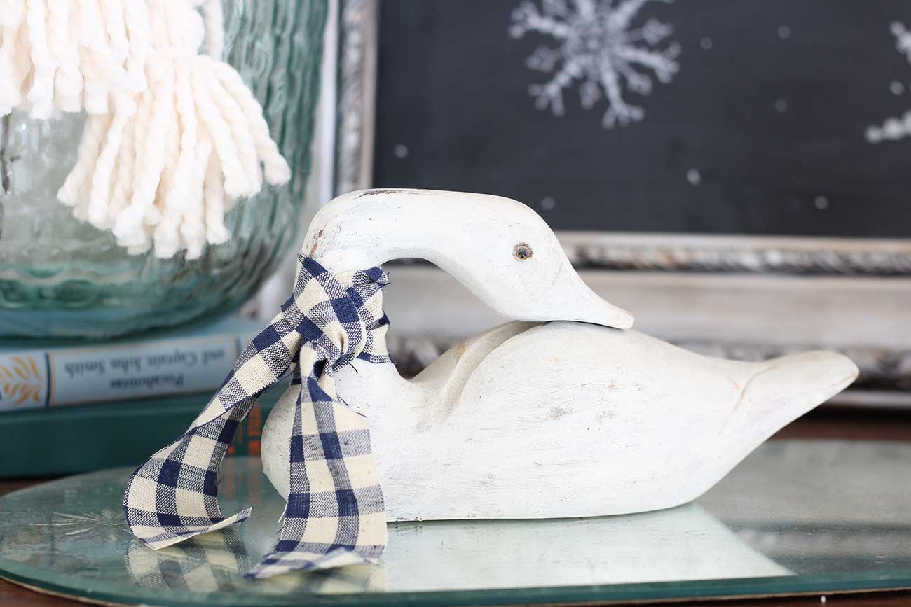 Goose with gingham scarf or bow.