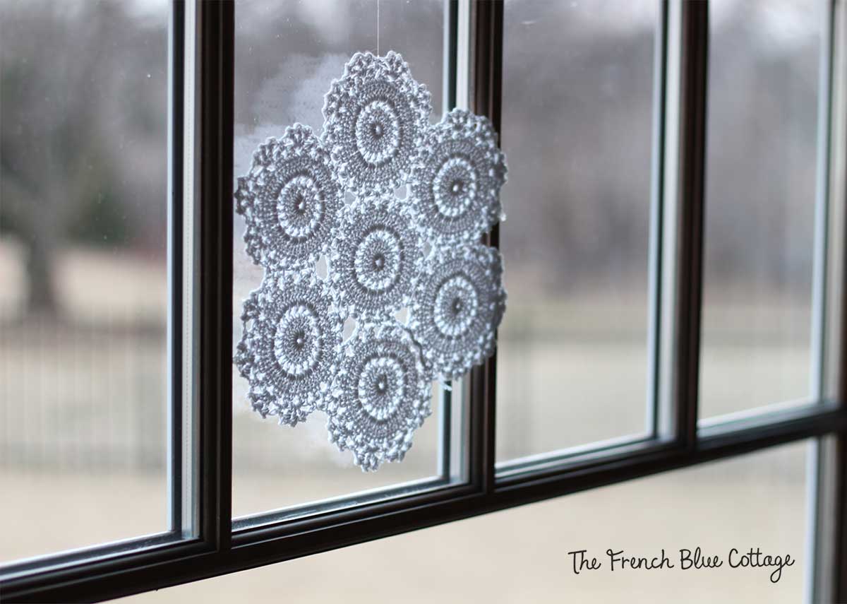Large crocheted snowflake.