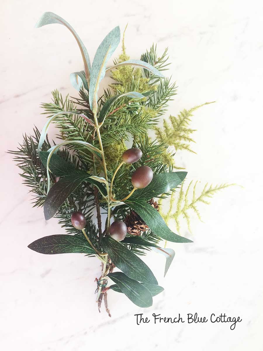 Mixed greenery sections for winter wreath.