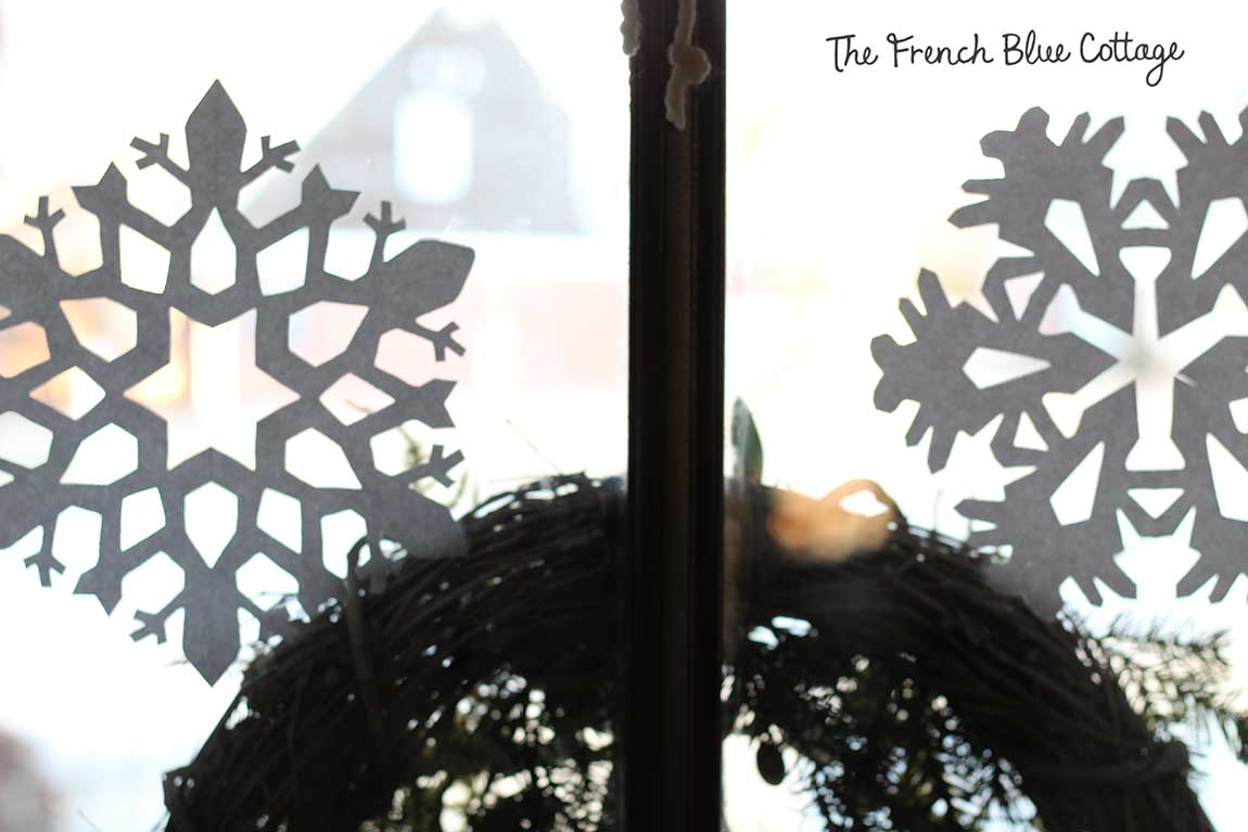 Patterned snowflakes on the front door.