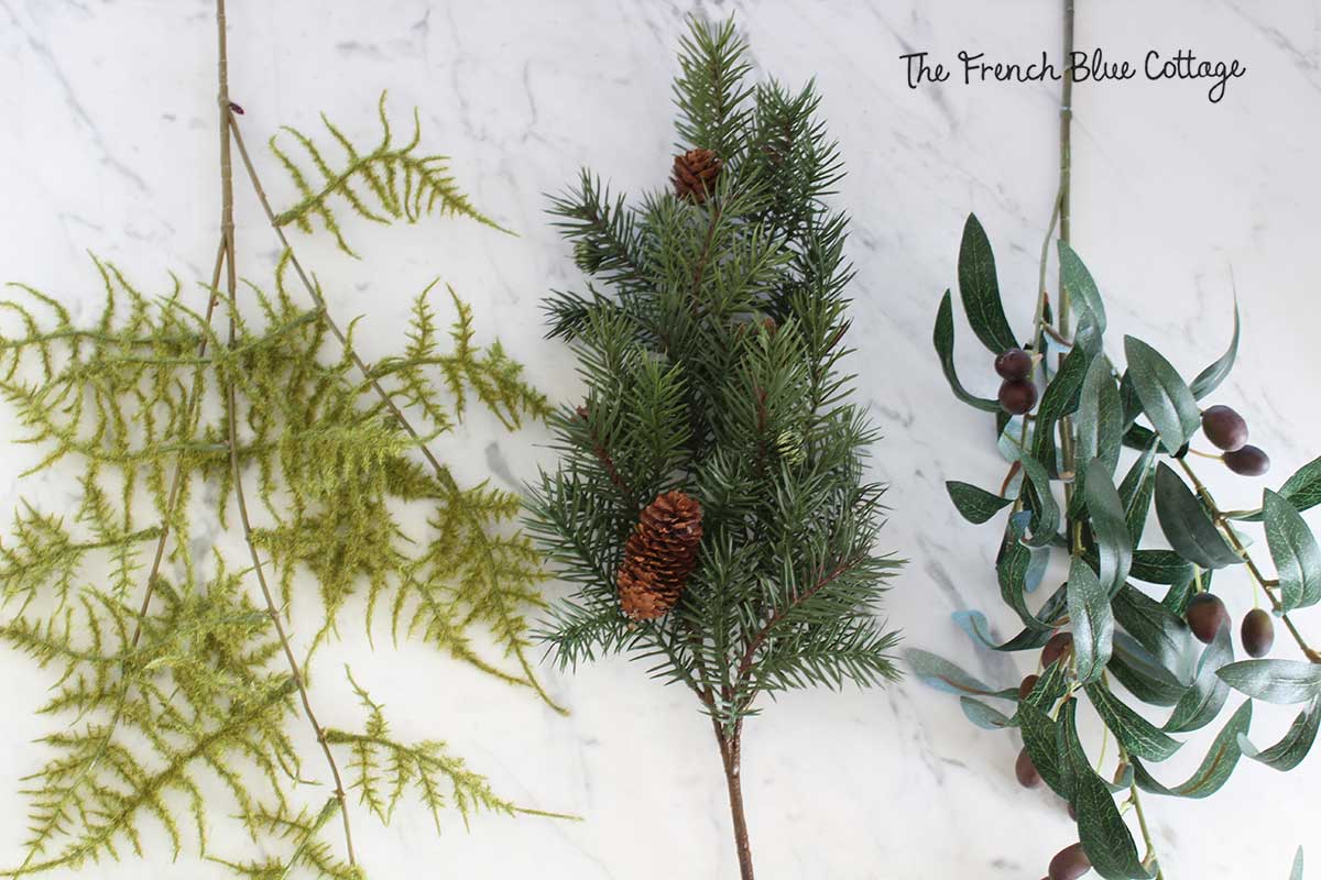 Winter greenery stems for wreath.