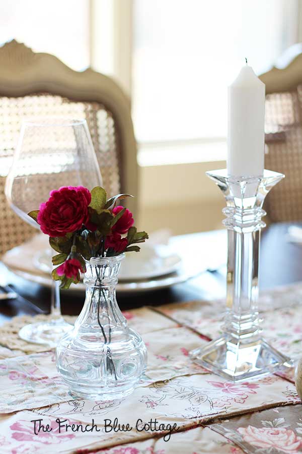 Crystal candlesticks with glass vase.