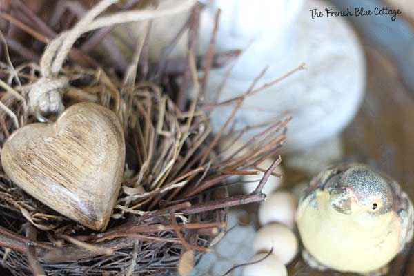 vignette wood heart in nest