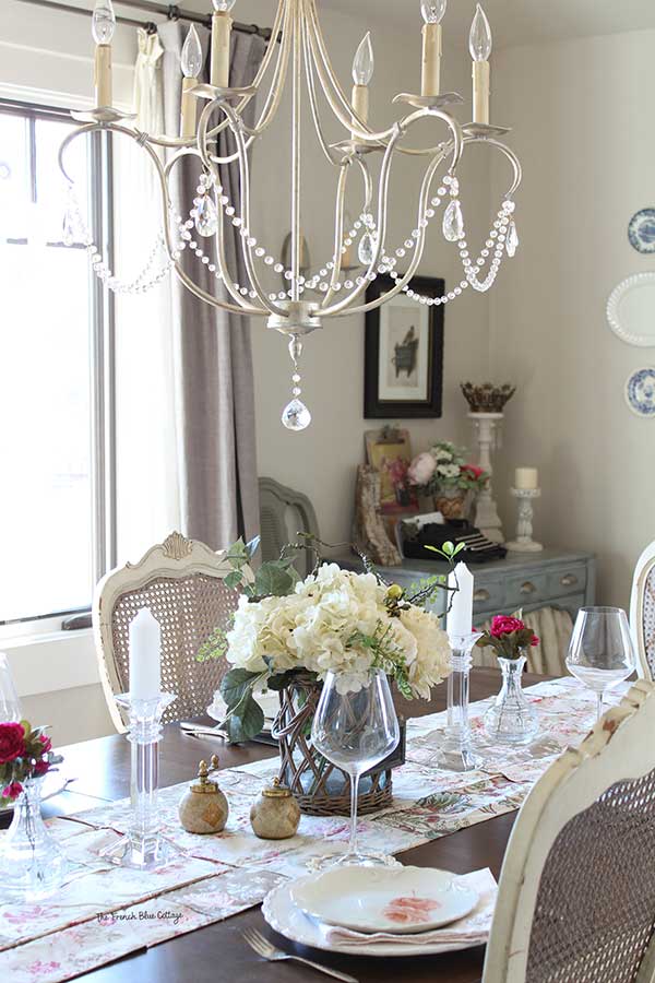 Shabby chic dining with crystal.