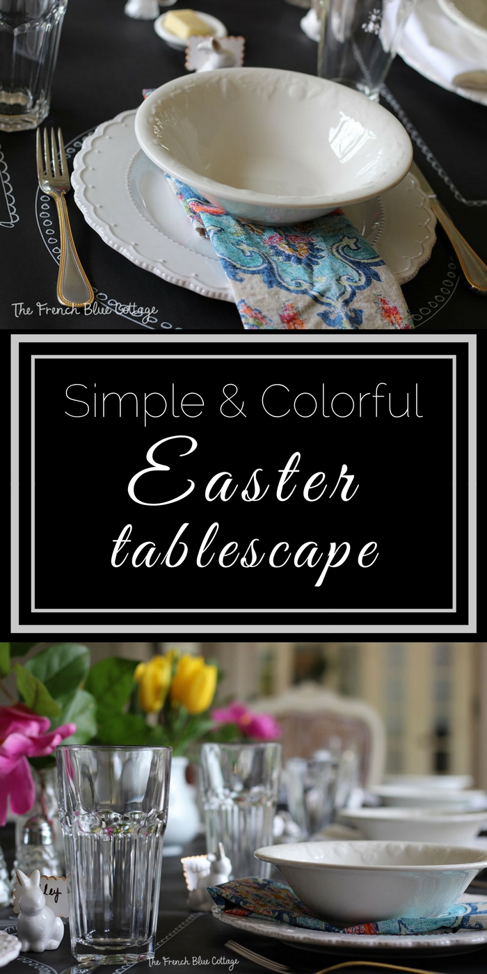 A colorful DIY Easter table with black craft paper, a chalk pen, and grocery store flowers.