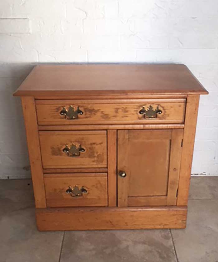 A vintage washstand in need of a makeover.
