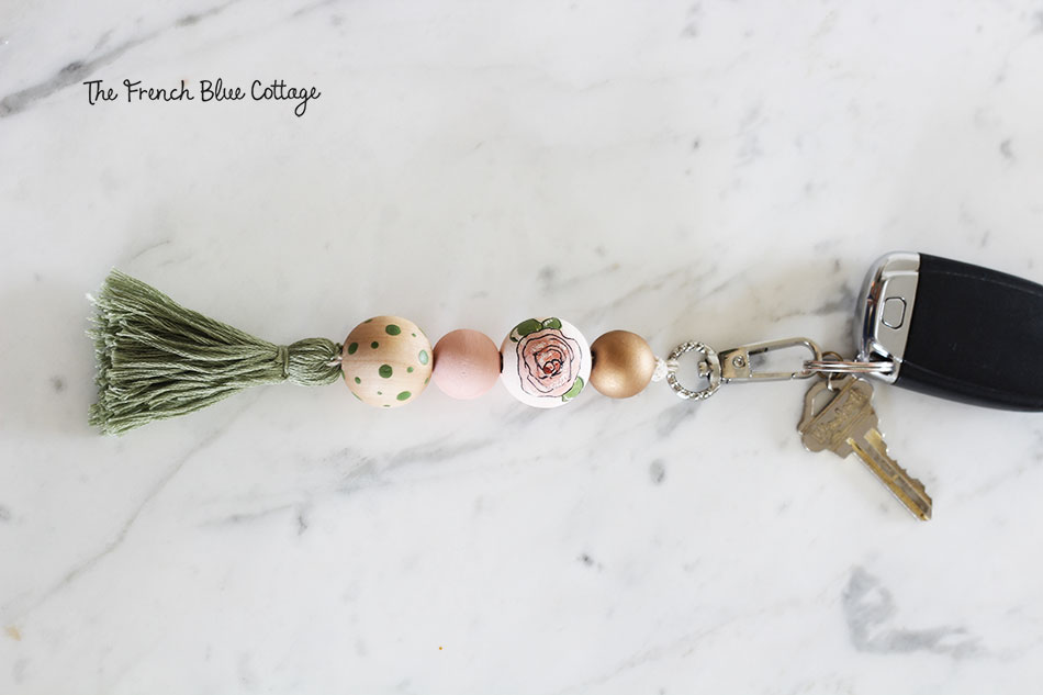 DIY floral wood bead and tassel key ring. 