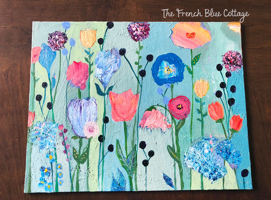You can make a layered painting of flowers using acrylic paints.