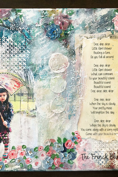 A mixed media collage of a little girl in the rain.