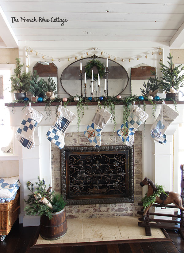 Christmas mantel with antique mirrors.