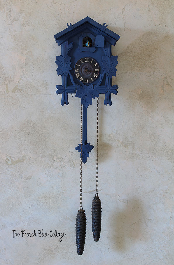 blue painted cuckoo clock