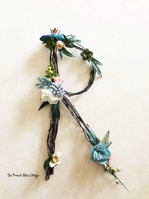 twig letter r embellished with felt flowers