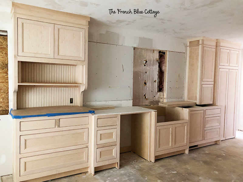 bare wood cabinets in a kitchen remodel