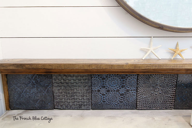 handmade textured tiles as a bathroom backsplash