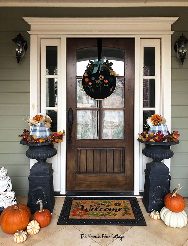 embroidery hoop wreath on a fall front porch