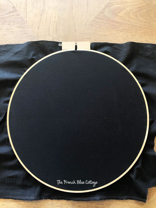 black linen in embroidery hoop