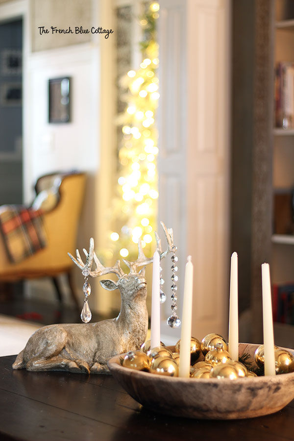 French country Christmas decor on coffee table with deer and advent wreath