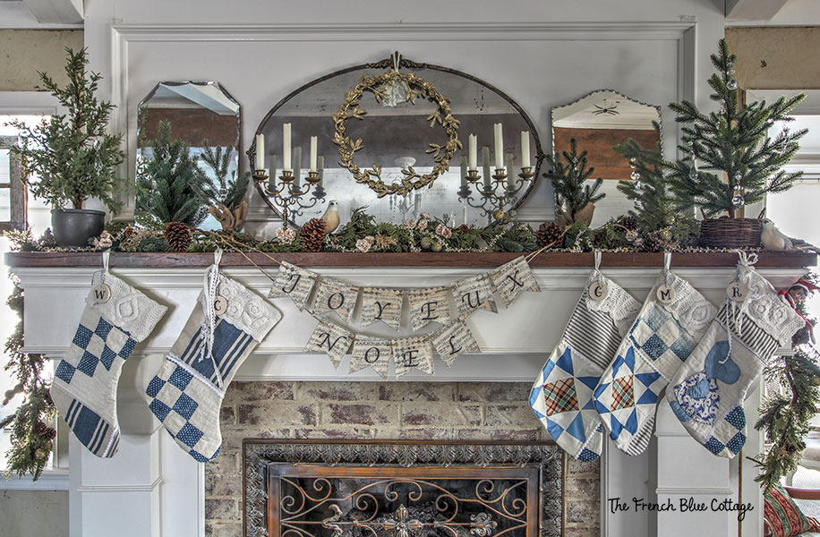 French country Christmas decor on mantel with quilted stockings