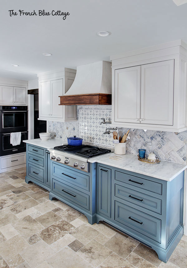 french country kitchen remodel in blue and white and with travertine tile floor
