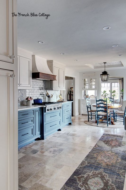 french country inspired kitchen remodel with plaster vent hood