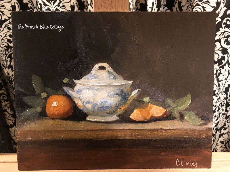 Still life oil painting of blue and white bowl and oranges