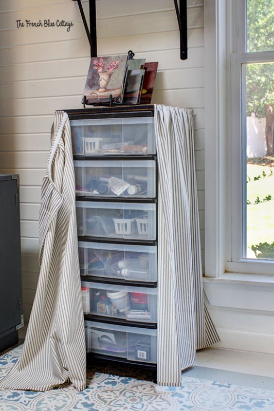 creative craft room storage with a slipcover for plastic storage drawers