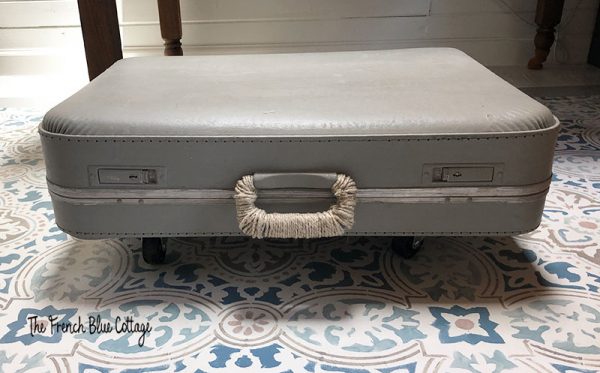 creative craft storage with vintage suitcase and casters