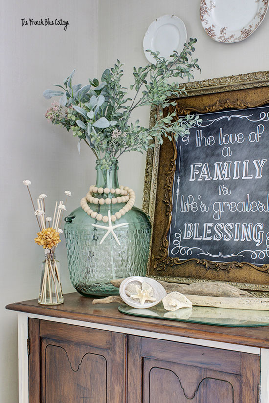 flower reed diffuser in beach vignette