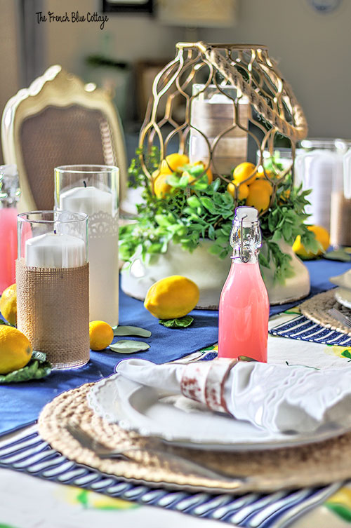 pink lemonade in glass bottles on tablescape
