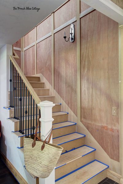 wood trimmed unfinished staircase