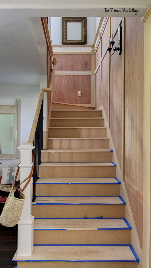 wood trimmed unfinished staircase