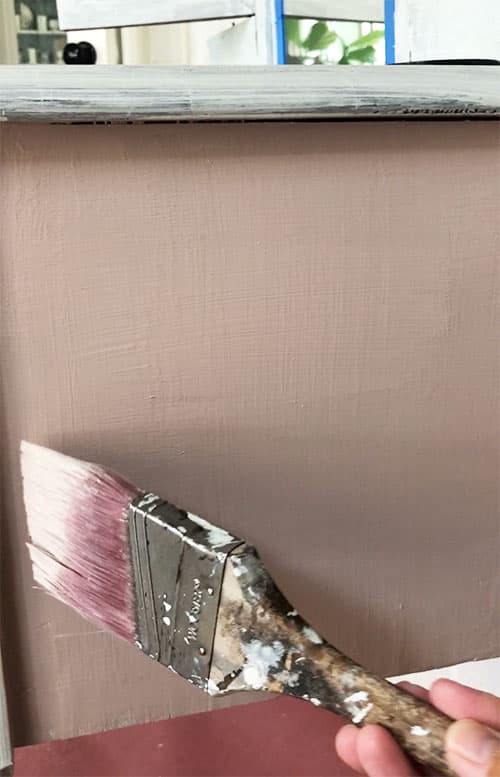 cross hatch painting a pink antique vanity