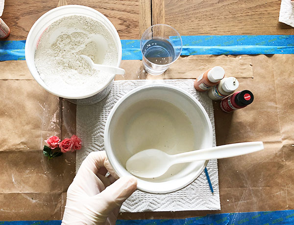 mix water and plaster of paris in a bowl