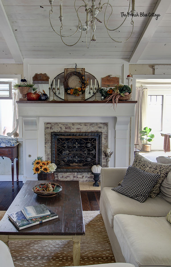 white mantel with fall decor